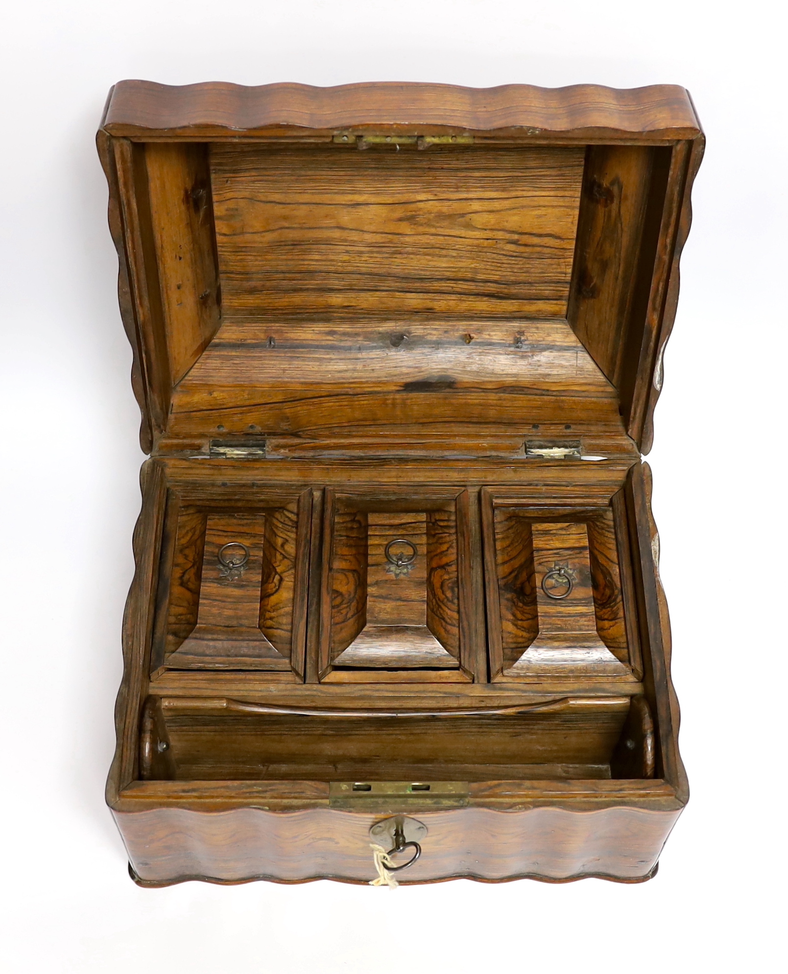 A Ceylonese calamander tea caddy, c.1820, with four internal compartments and key, 29cm wide